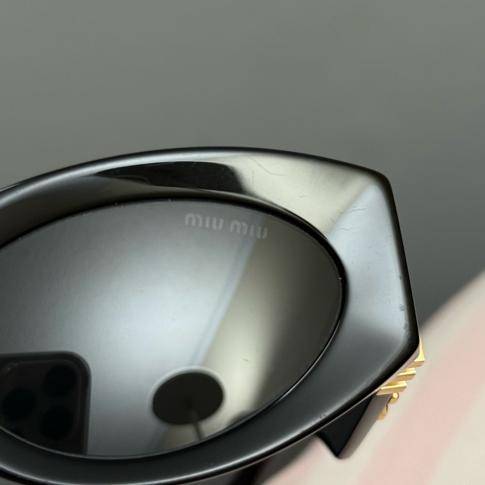 Miu Miu Black Oval Sunglasses with Gold Logo Temples - Picture 8 of 14